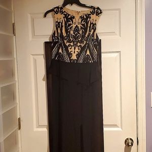 Beautiful Black and Cream colored with sequined detail evening gown